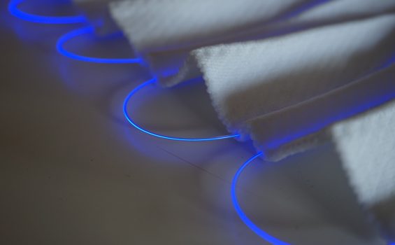 fibers of blue light in a 3D smart knit textile