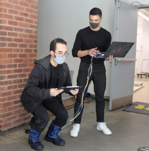 two men showing usage and feedback of sensory boots