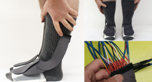 model in grey socks with foot sensors