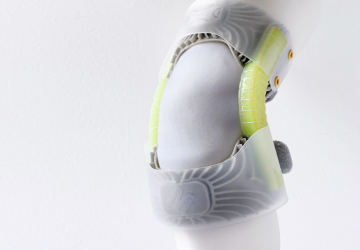 Mixo-suit knee component with yellow artificial muscles
